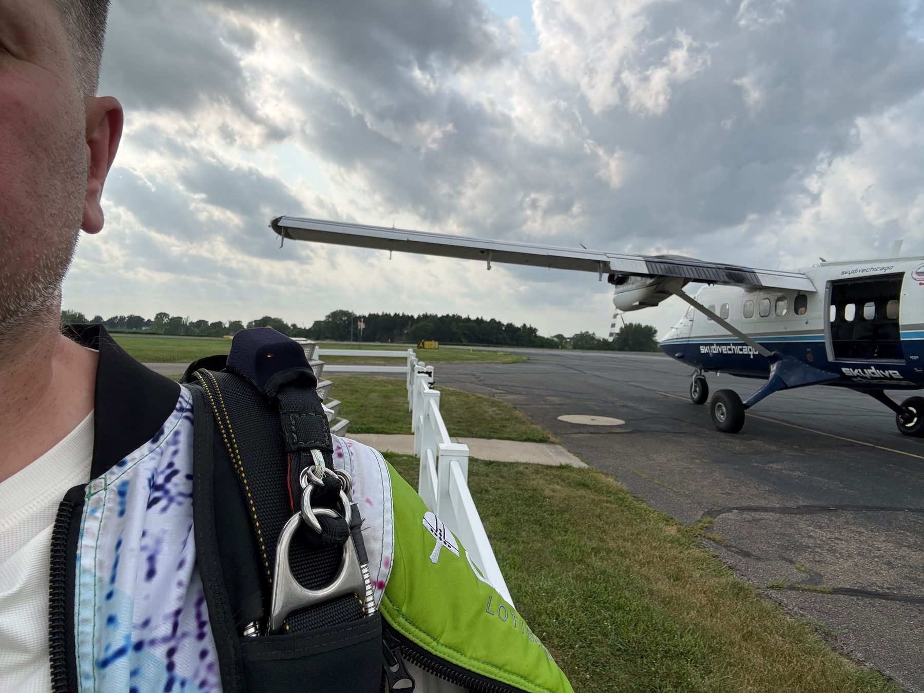 Andrey Baykov geared up beside the jump aircraft at the loading area